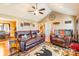 Open living space with leather sofas and hardwood floors at 910 Island Ford Rd, Maiden, NC 28650