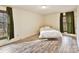 Cozy bedroom with a single bed and light wood flooring at 10035 Little Creek Rd, Mint Hill, NC 28227