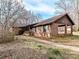 Brick ranch house with attached carport and walkway at 10035 Little Creek Rd, Mint Hill, NC 28227