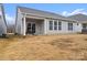 Private backyard with patio and grassy area at 111 N Shayna Rd, Troutman, NC 28166