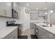 Gray cabinets and white countertops in this open kitchen at 111 N Shayna Rd, Troutman, NC 28166