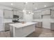 Modern kitchen with gray cabinets, white countertops, and island at 111 N Shayna Rd, Troutman, NC 28166