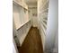 Large walk-in closet with hanging rods and shelving at 14243 Richmond Park Ave, Charlotte, NC 28277