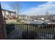 View of community with parking and townhouses at 14243 Richmond Park Ave, Charlotte, NC 28277