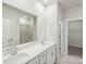 Modern bathroom with double vanity and walk-in shower at 1535 Harper Landing Blvd, Stanley, NC 28164