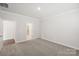 Bright bedroom featuring neutral walls and carpeting at 1535 Harper Landing Blvd, Stanley, NC 28164