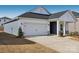 Two-story house with gray and white siding and a two-car garage at 1535 Harper Landing Blvd, Stanley, NC 28164