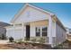 Two-story house with gray siding and a covered porch at 1535 Harper Landing Blvd, Stanley, NC 28164