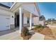 Charming front porch with brick columns and landscaping at 1535 Harper Landing Blvd, Stanley, NC 28164