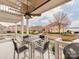 Outdoor balcony with seating area and lake views at 18015 Kings Point Dr # F, Cornelius, NC 28031