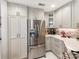 Modern kitchen with stainless steel appliances and ample cabinet storage at 18015 Kings Point Dr # F, Cornelius, NC 28031