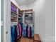 Well-organized walk-in closet with shelving and hanging rods at 18119 Coulter Pkwy, Cornelius, NC 28031