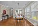 Bright dining room with hardwood floors and access to sunroom at 18119 Coulter Pkwy, Cornelius, NC 28031