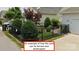 Example of a fenced and landscaped front yard at 18119 Coulter Pkwy, Cornelius, NC 28031