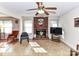 Bright living room with fireplace and tile flooring at 1830 Light Brigade Dr, Matthews, NC 28105