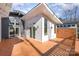 Spacious deck with modern lighting and wooden flooring at 1906 Lakedell Dr, Charlotte, NC 28215