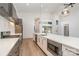 Modern kitchen with stainless steel appliances and island at 1906 Lakedell Dr, Charlotte, NC 28215