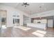 Modern kitchen with white island and dark gray cabinets at 1906 Lakedell Dr, Charlotte, NC 28215