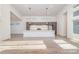 Modern kitchen with white island and dark gray cabinets at 1906 Lakedell Dr, Charlotte, NC 28215