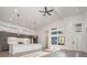 Bright kitchen with white cabinets, island, and stainless steel appliances at 1906 Lakedell Dr, Charlotte, NC 28215