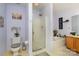 Clean bathroom with shower, tub, and updated vanity at 2219 Kirkgate Ln, Charlotte, NC 28215