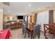 Bright dining area with seating for four and hardwood floors at 2219 Kirkgate Ln, Charlotte, NC 28215