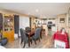 Bright dining area with table and chairs, open to kitchen at 2219 Kirkgate Ln, Charlotte, NC 28215