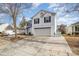 Two-story house with attached garage and front yard at 2219 Kirkgate Ln, Charlotte, NC 28215