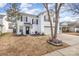 Two-story house with attached garage and landscaping at 2219 Kirkgate Ln, Charlotte, NC 28215