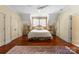 Spacious bedroom with hardwood floors and large windows at 2310 La Maison Dr, Charlotte, NC 28226