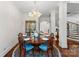 Elegant dining room featuring a large table and chandelier at 2310 La Maison Dr, Charlotte, NC 28226