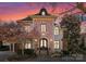 Brick and stone home with a charming front entrance at 2310 La Maison Dr, Charlotte, NC 28226