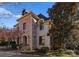 Brick and stone home with a charming front entrance and landscaping at 2310 La Maison Dr, Charlotte, NC 28226