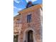 Brick facade with stone accents and arched entryway at 2310 La Maison Dr, Charlotte, NC 28226