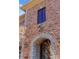 Detailed view of the home's brick facade and stone accents at 2310 La Maison Dr, Charlotte, NC 28226