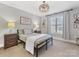 Spacious bedroom with double bed and neutral decor at 353 Killian Ct, Matthews, NC 28104