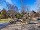 Cozy fire pit area with comfortable seating for relaxing evenings at 353 Killian Ct, Matthews, NC 28104