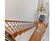 Elegant staircase with wrought iron railing and hardwood floors at 353 Killian Ct, Matthews, NC 28104