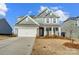 Two-story house with gray siding, white trim, and a two-car garage at 414 Shallowford Dr # 44, Rock Hill, SC 29732