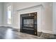 Modern fireplace with a dark stone hearth at 414 Shallowford Dr # 44, Rock Hill, SC 29732