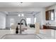 Kitchen sink and faucet with view into living room at 414 Shallowford Dr # 44, Rock Hill, SC 29732