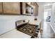 Stainless steel appliances and white cabinetry highlight this modern kitchen at 414 Shallowford Dr # 44, Rock Hill, SC 29732