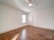 Spacious bedroom featuring hardwood floors and a ceiling fan at 535 Brooklyn Ave, Cramerton, NC 28032