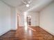 Bright bedroom with hardwood floors and ceiling fan at 535 Brooklyn Ave, Cramerton, NC 28032