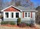 Charming ranch home with gray siding, updated windows, and landscaping at 535 Brooklyn Ave, Cramerton, NC 28032