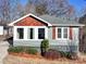 Charming ranch home with gray siding, wood accents, and landscaping at 535 Brooklyn Ave, Cramerton, NC 28032