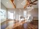 Bright living room with hardwood floors, exposed beams, and two armchairs at 535 Brooklyn Ave, Cramerton, NC 28032