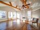 Spacious living area with hardwood floors, exposed beams, and large windows at 535 Brooklyn Ave, Cramerton, NC 28032