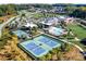 Aerial view of community with tennis courts, pool, and clubhouse at 7145 Hanging Rock Ct, Denver, NC 28037