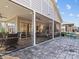 Screened porch and patio with paver stones at 7145 Hanging Rock Ct, Denver, NC 28037